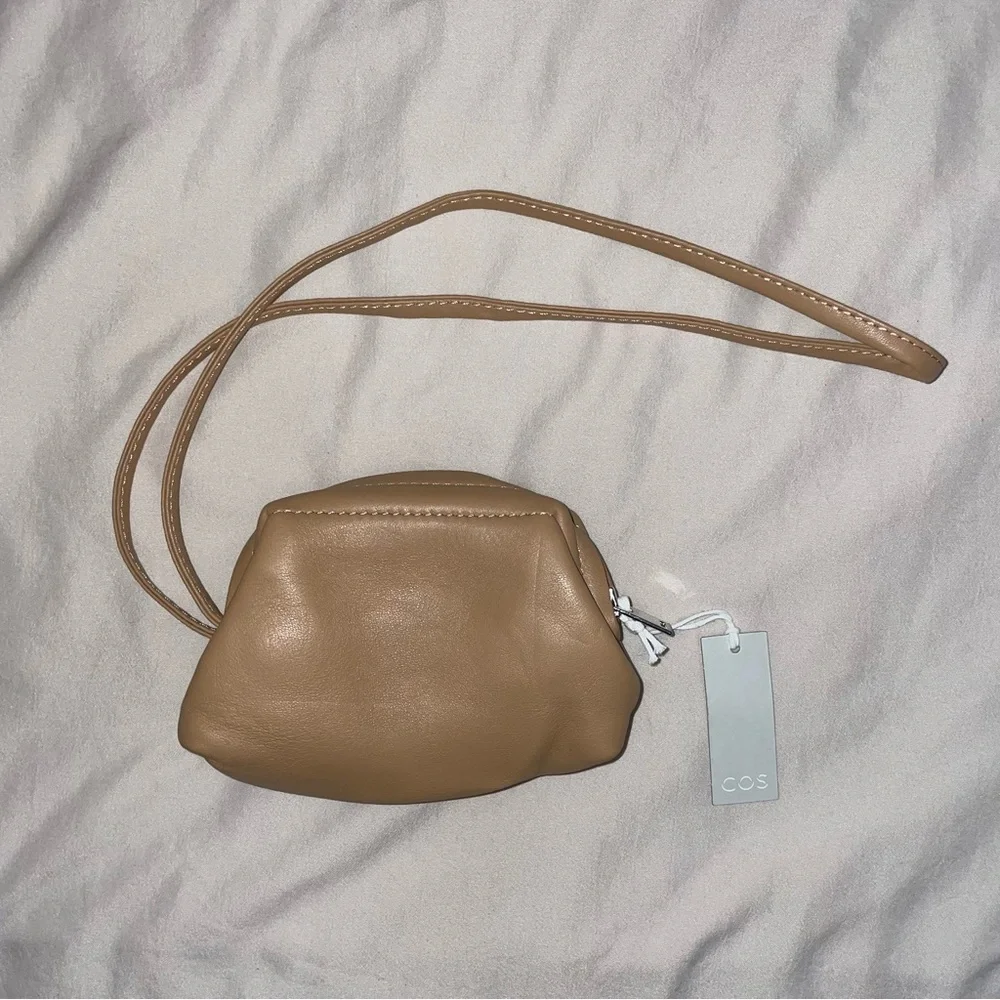 COS wristlet - Picture 1 of 2
